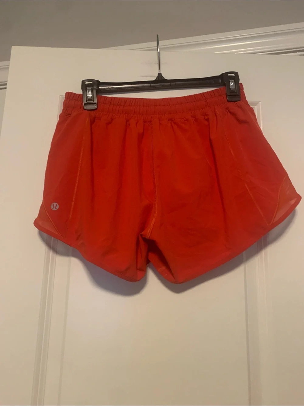 Lululemon Carnation Red Hotty Hot Shorts 4in Sz 8, GUC, 1 pin hole in the back